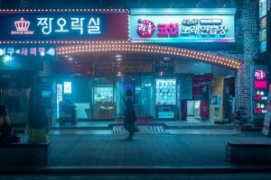 韓国　バッグを持って店の前を歩く女性